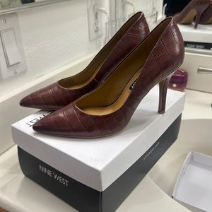 Nine West Crocodile heels. 3.5 inches.